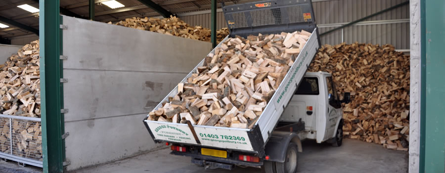 Photo of a loose load of firewood ready for delivery by George Potbury Forestry Ltd in Horsham.